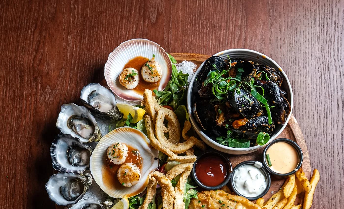 Oysters, squid, mussels and fish arranged on The Old Forge seafood platter